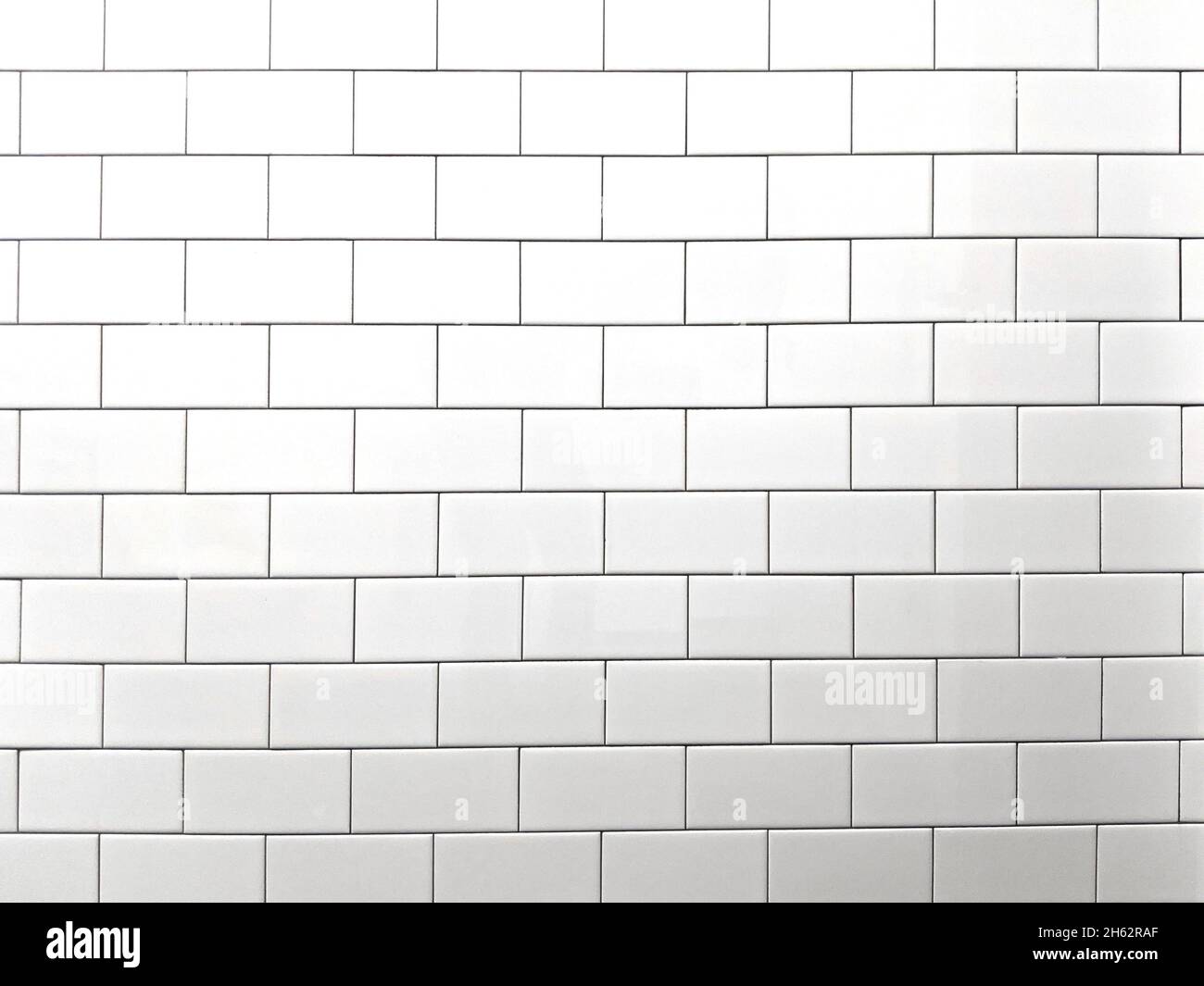 Seamless white bathroom wall tiles. Pattern, brick texture for