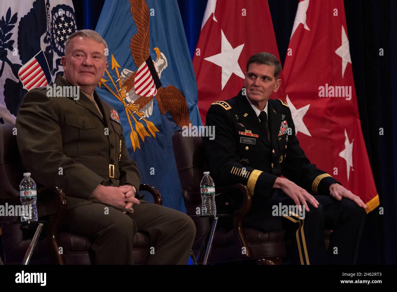 Reportage:   The new commander of U.S. Central Command, U.S. Marine Corps Gen. Kenneth F. McKenzie Jr., and the outgoing Centcom commander, U.S. Army Gen. Joseph L. Votel, are seen at the Centcom change of command, Tampa, Florida, March 28, 2019. Stock Photo