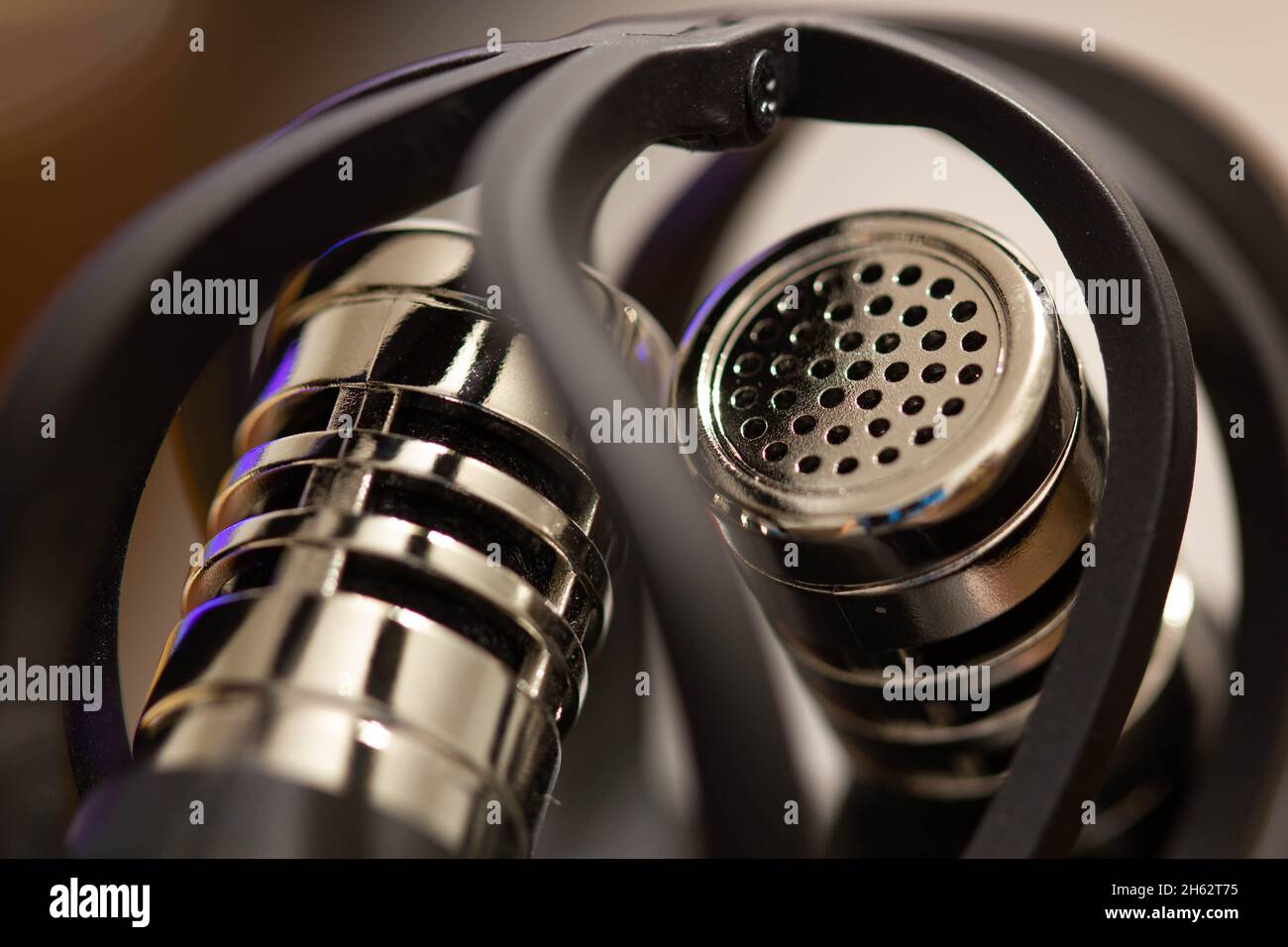 Stereo Microphones. Compact audio recorder in a music studio. Built-In portable dictaphone for recording. Metallic chrome plated microphone. Digital Stock Photo