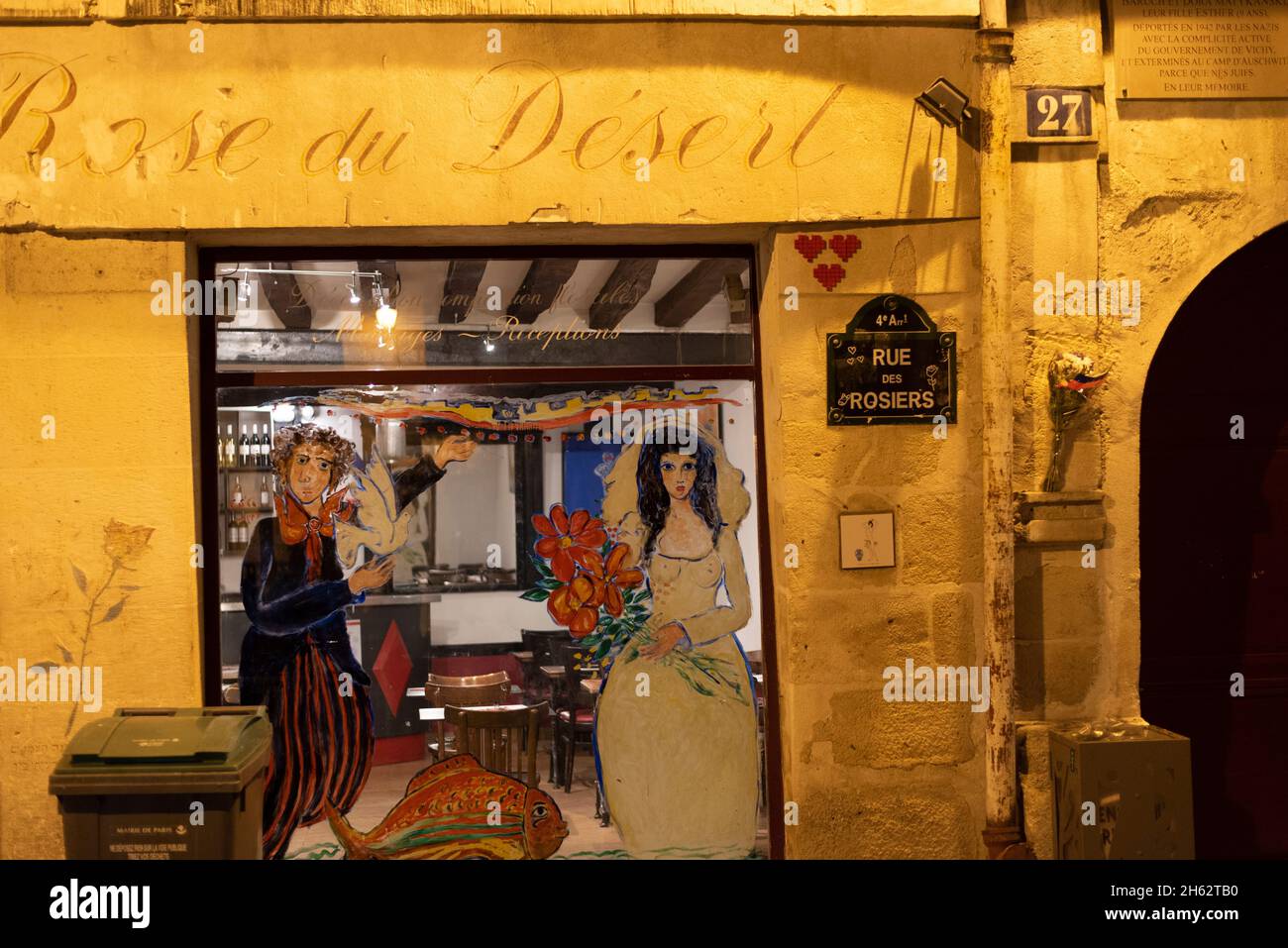 france,paris,wine bar la rose du desert,three hearts on the wall,jewish district of the marais Stock Photo