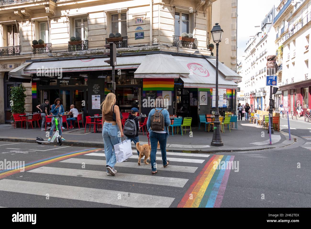 france,paris,tourists walk across a zebra crossing in the rue des archives in the jewish district of the marais Stock Photo