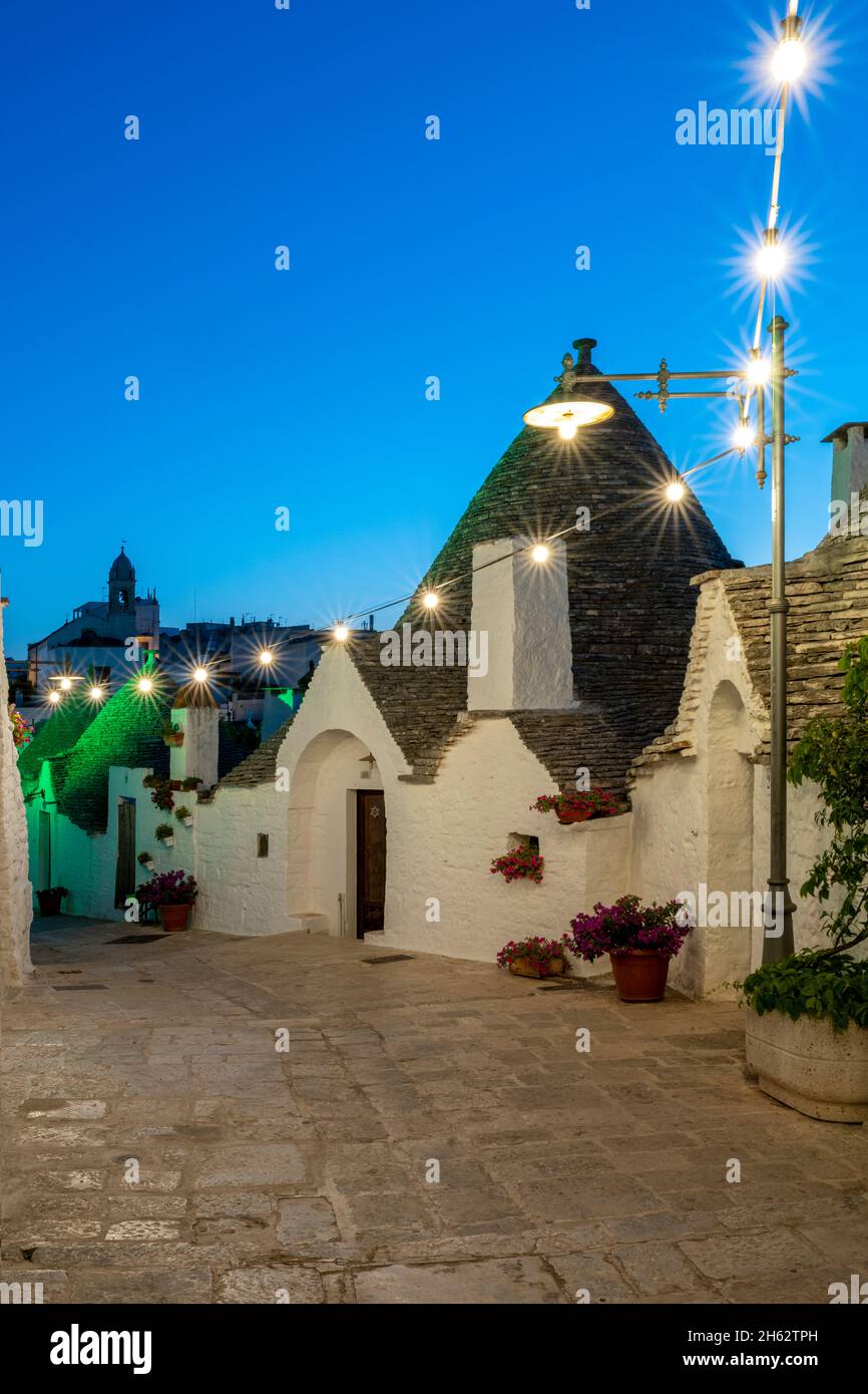alberobello,bari province,salento,apulia,italy,europe. dawn in alberobelle with the typical trulli houses with their conical roof in drywall style Stock Photo