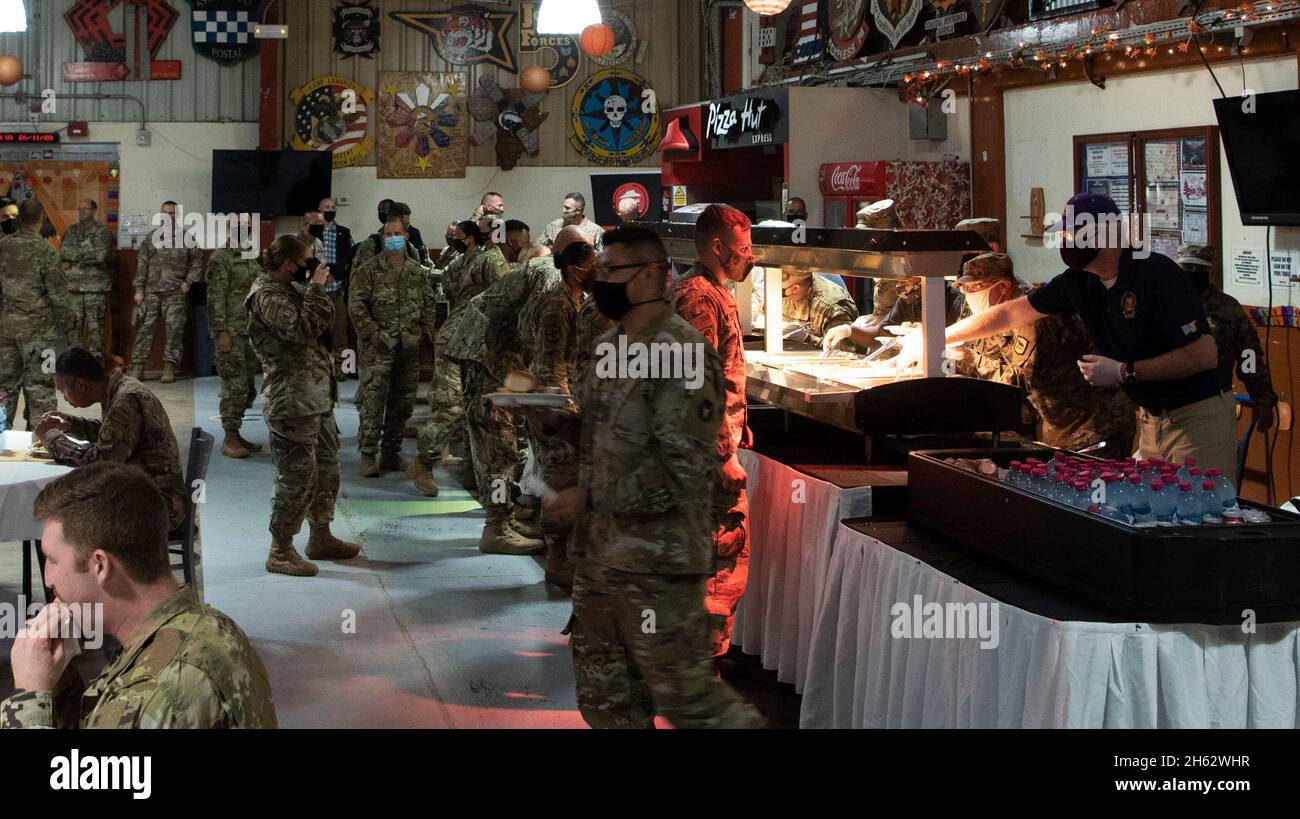 Reportage:  Acting Defense Secretary Christopher C. Miller serves Thanksgiving dinner to troops at Camp Lemonnier, Djibouti, Nov. 26, 2020. Stock Photo