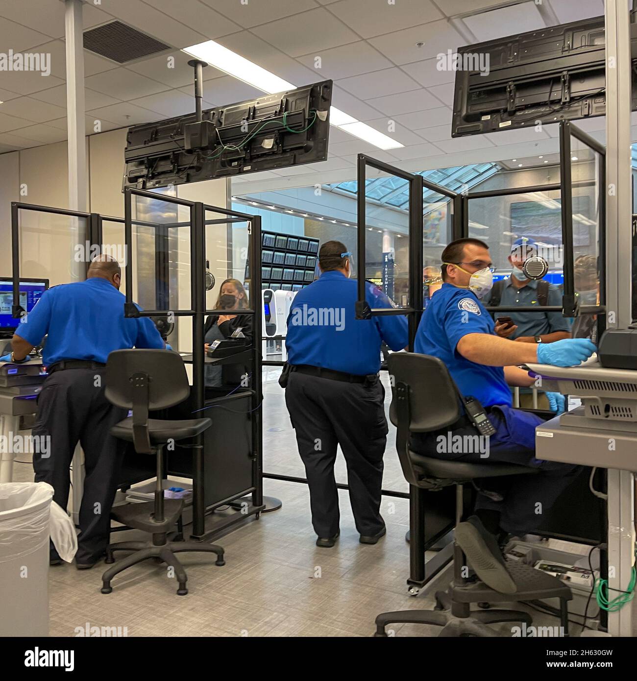 Orlando, FL USA - September 23, 2021:  People walking through the security line at Orlando International Airport MCO. Stock Photo