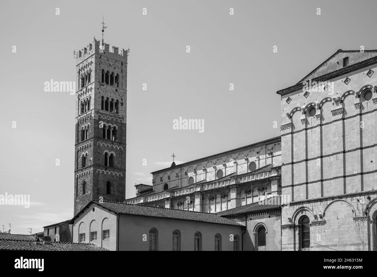 romanesque facade and bell tower of st. martin cathedral in lucca,tuscany. it contains most precious relic in lucca,holy face of lucca (italian: volto santo di lucca) Stock Photo