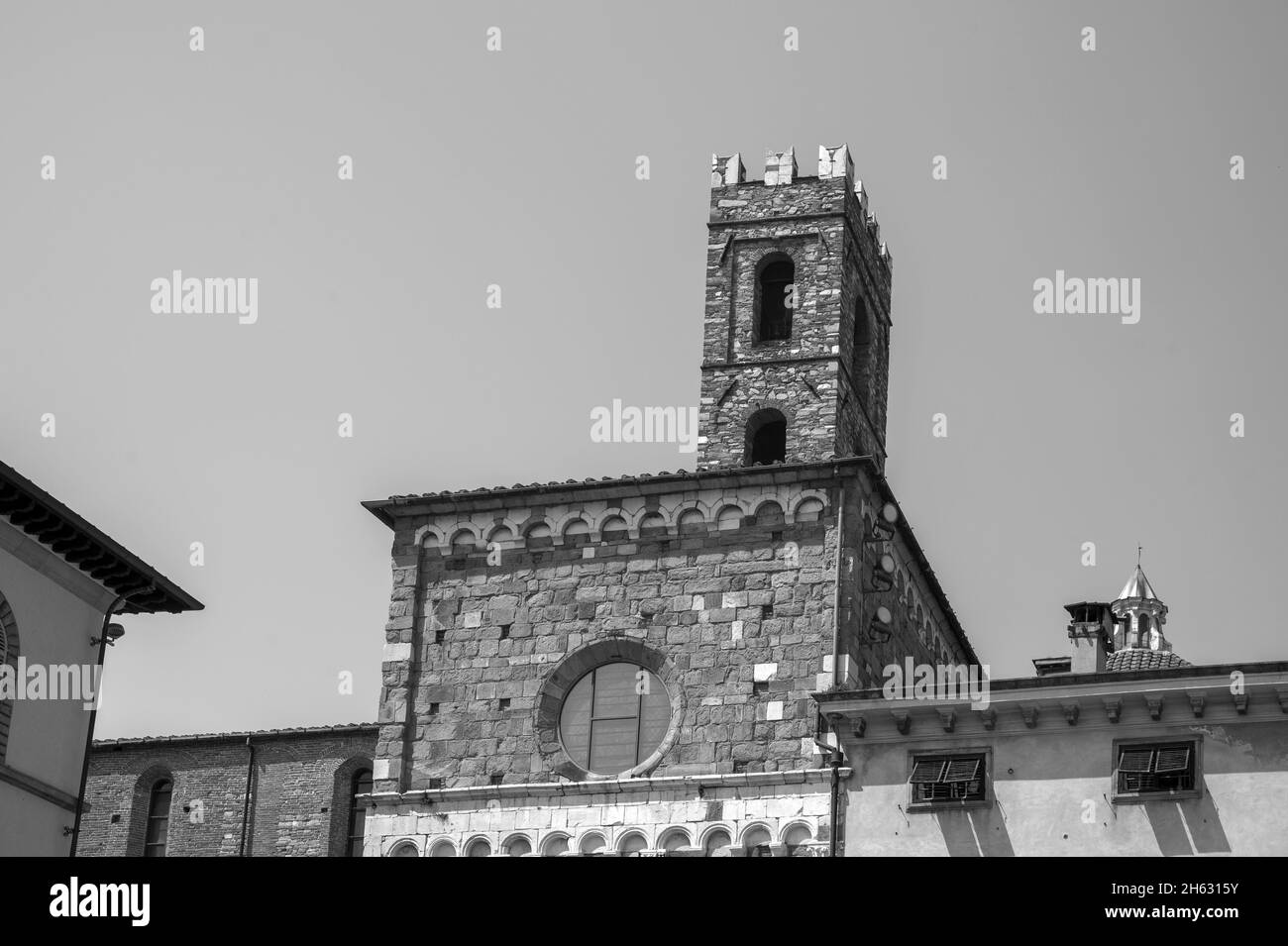 romanesque facade and bell tower of st. martin cathedral in lucca,tuscany. it contains most precious relic in lucca,holy face of lucca (italian: volto santo di lucca) Stock Photo