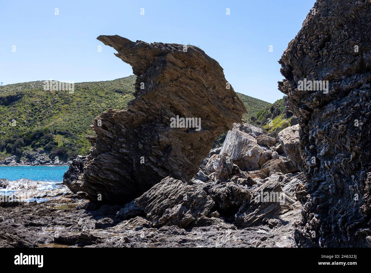 very strange looking rocks at the beach somewhere in greece Stock Photo ...