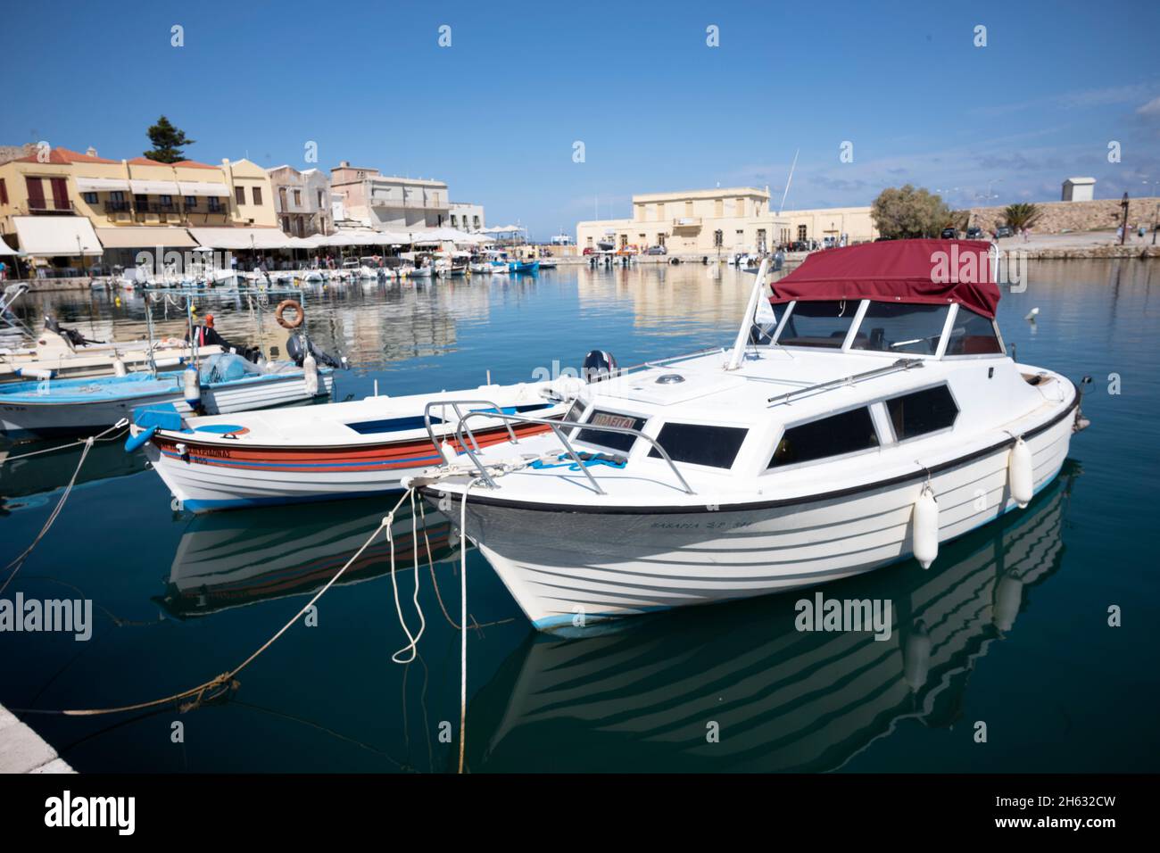 visiting the harbor of the old charming town of rethymno. crete island,greece. a beautiful village at the mediterrane sea with historic buildings and a nice harbor Stock Photo