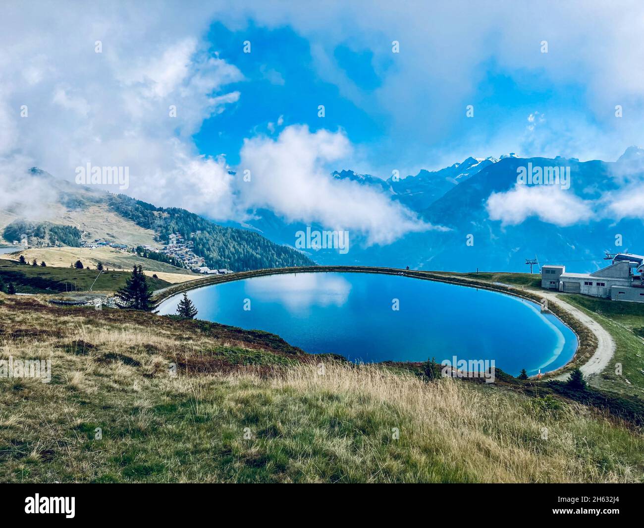 Lake in the Swiss Mountains in a cloudy scenery Stock Photo