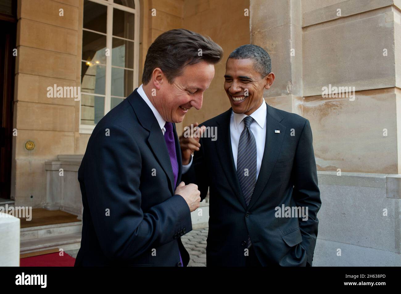 President Barack Obama talks with British Prime Minister David Cameron following their joint press conference at Lancaster House in London, England, May 25, 2011. Stock Photo