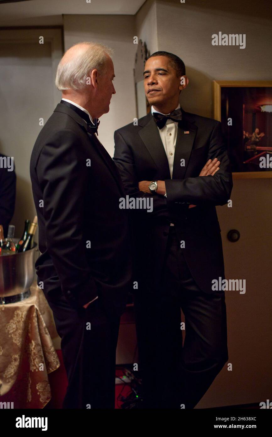 President Barack Obama and Vice President Joe Biden talk before the start of the Kennedy Center Honors at the John F. Kennedy Center for the Performing Arts in Washington, D.C., Dec. 6, 2009 Stock Photo