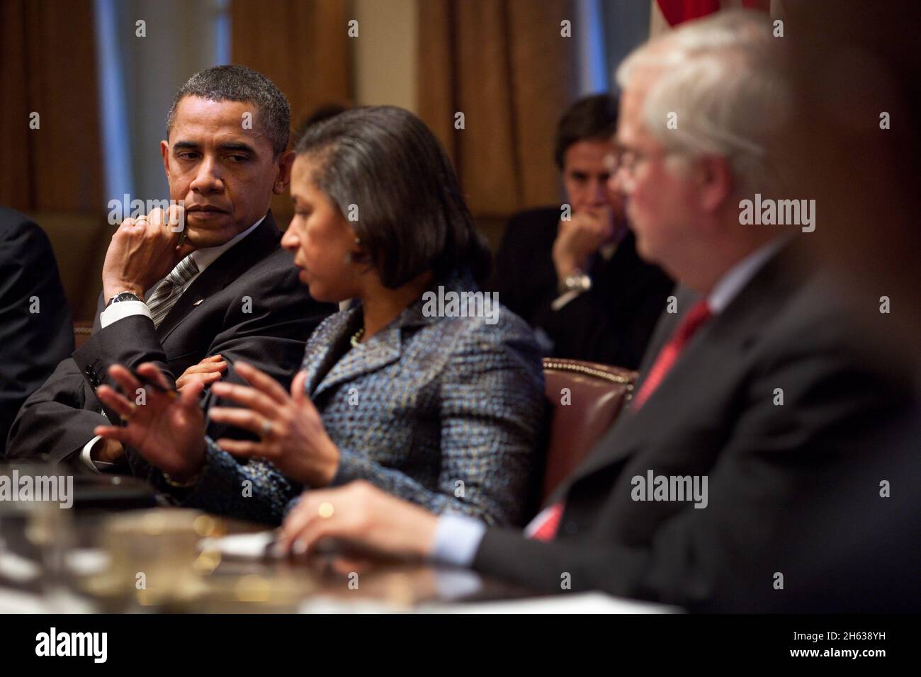 President Barack Obama listens as Susan Rice, U.S. Permanent Representative to the United Nations, speaks during a meeting with U.N. Ambassadors in the Cabinet Room of the White House, Dec. 13, 2010. Stock Photo