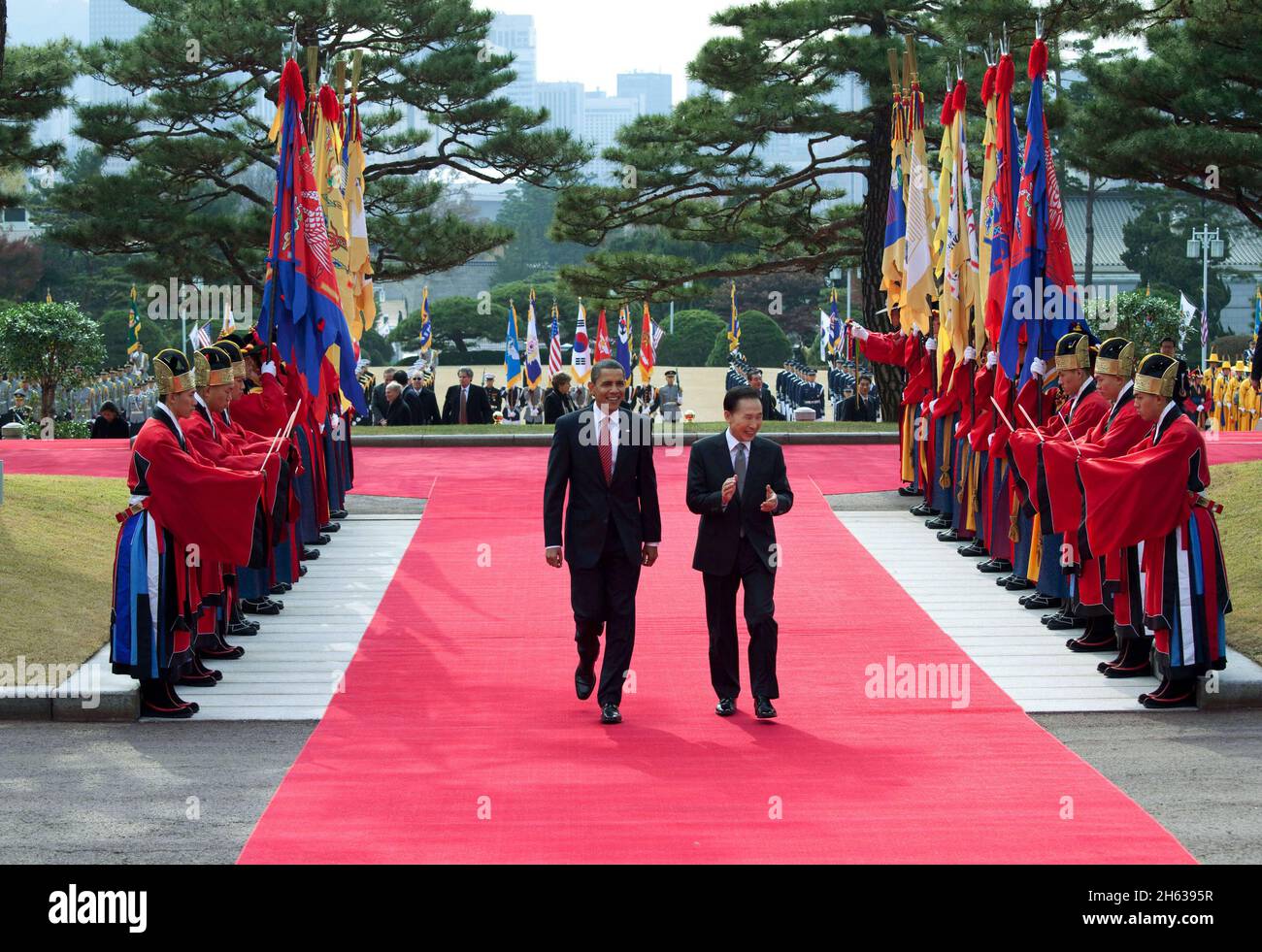 President Barack Obama walks with South Korean President Lee Myung-bak during an arrival ceremony at the Blue House in Seoul, South Korea, Nov. 19, 2009 Stock Photo