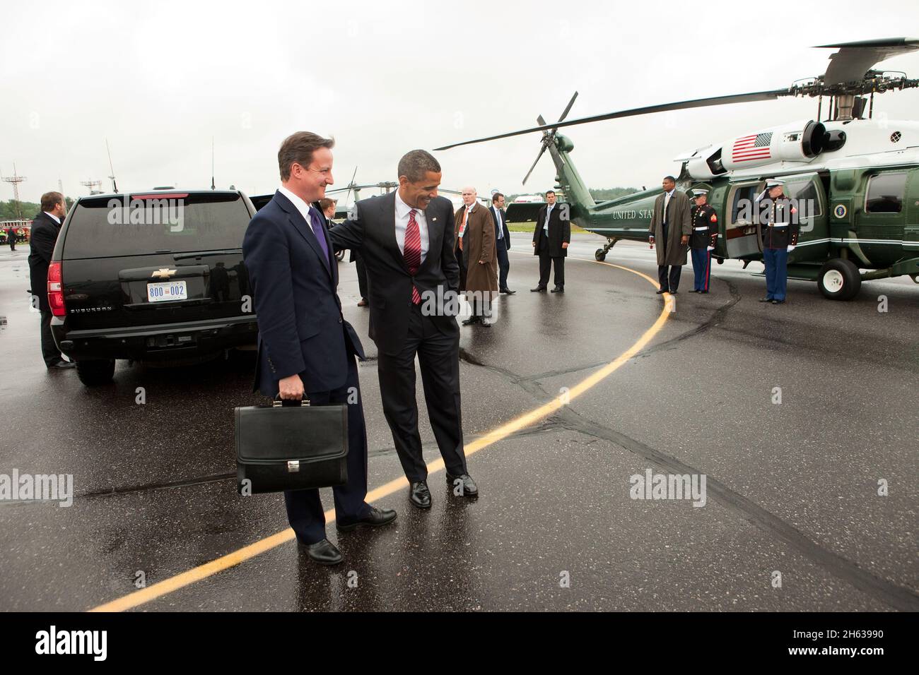 President Barack Obama and British Prime Minister David Cameron prepare to board Marine One at the Deerhurst Resort landing zone in Muskoka, Canada, following the conclusion of the G8 Summit, June 26, 2010. Stock Photo