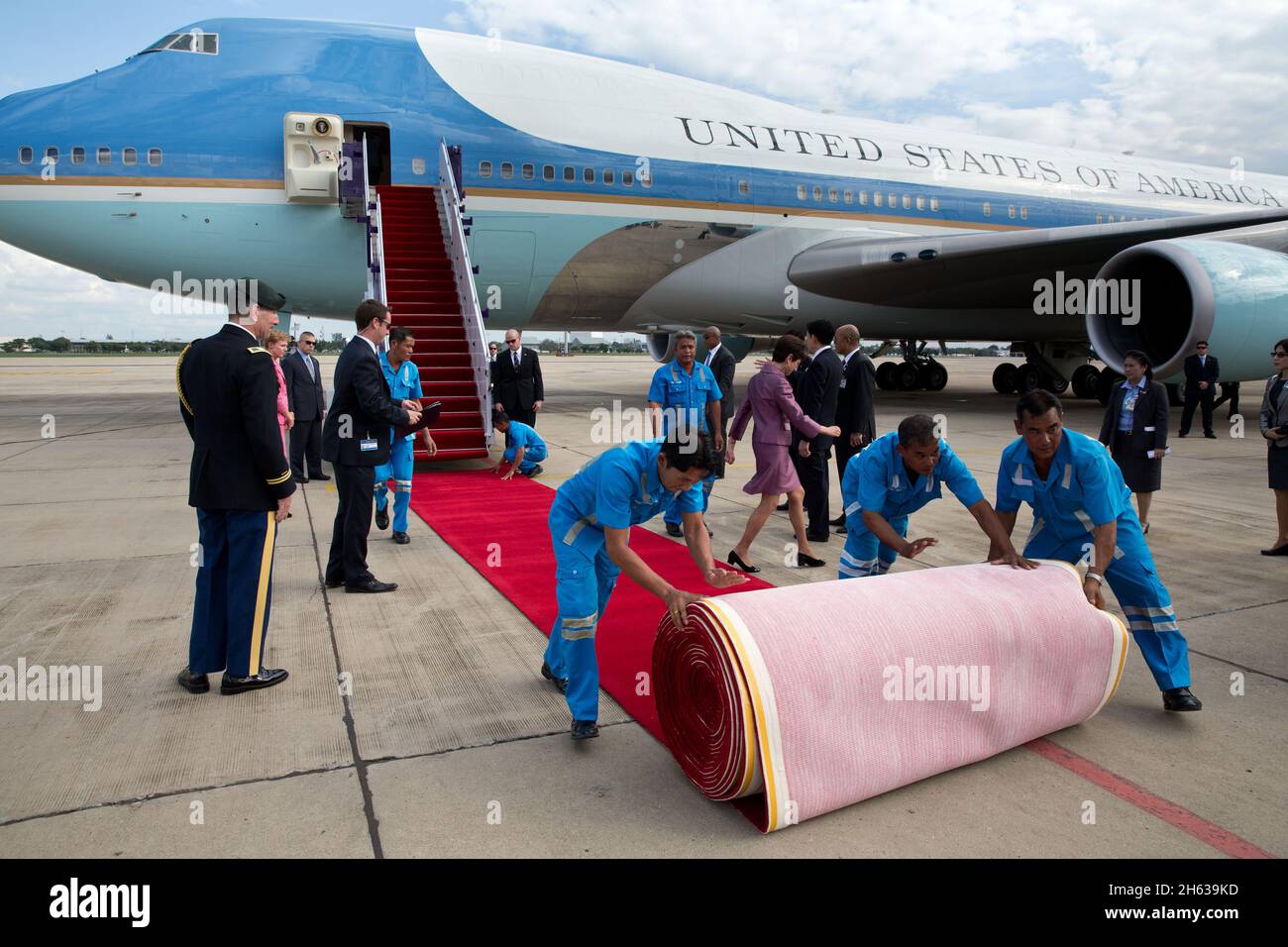 Workers prepare for an arrival ceremony to welcome President Barack Obama at Don Mueang International Airport in Bangkok, Thailand, Nov. 18, 2012. Stock Photo