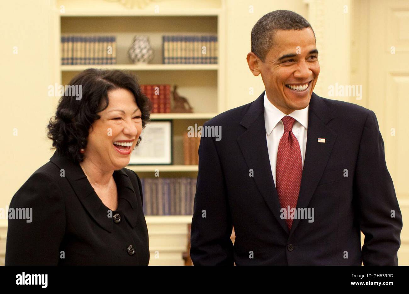 President Barack Obama and Justice Sonia Sotomayor meet in the Oval Office prior to a reception for the new Supreme Court Justice at the White House, August 12, 2009 Stock Photo