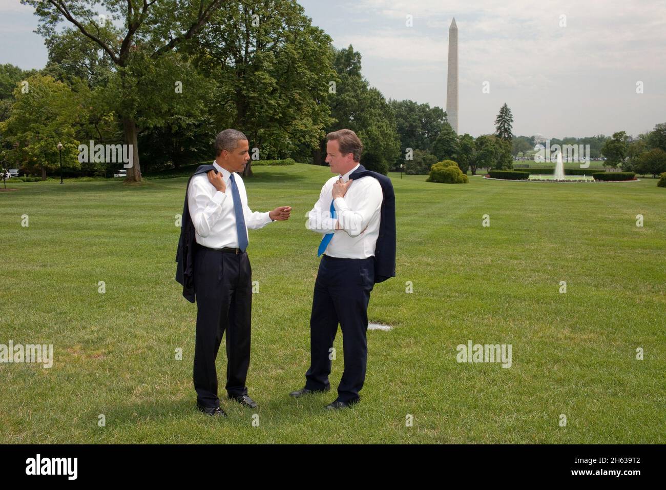 President Barack Obama and British Prime Minister David Cameron talk on the South Lawn of the White House, July 20, 2010. Stock Photo