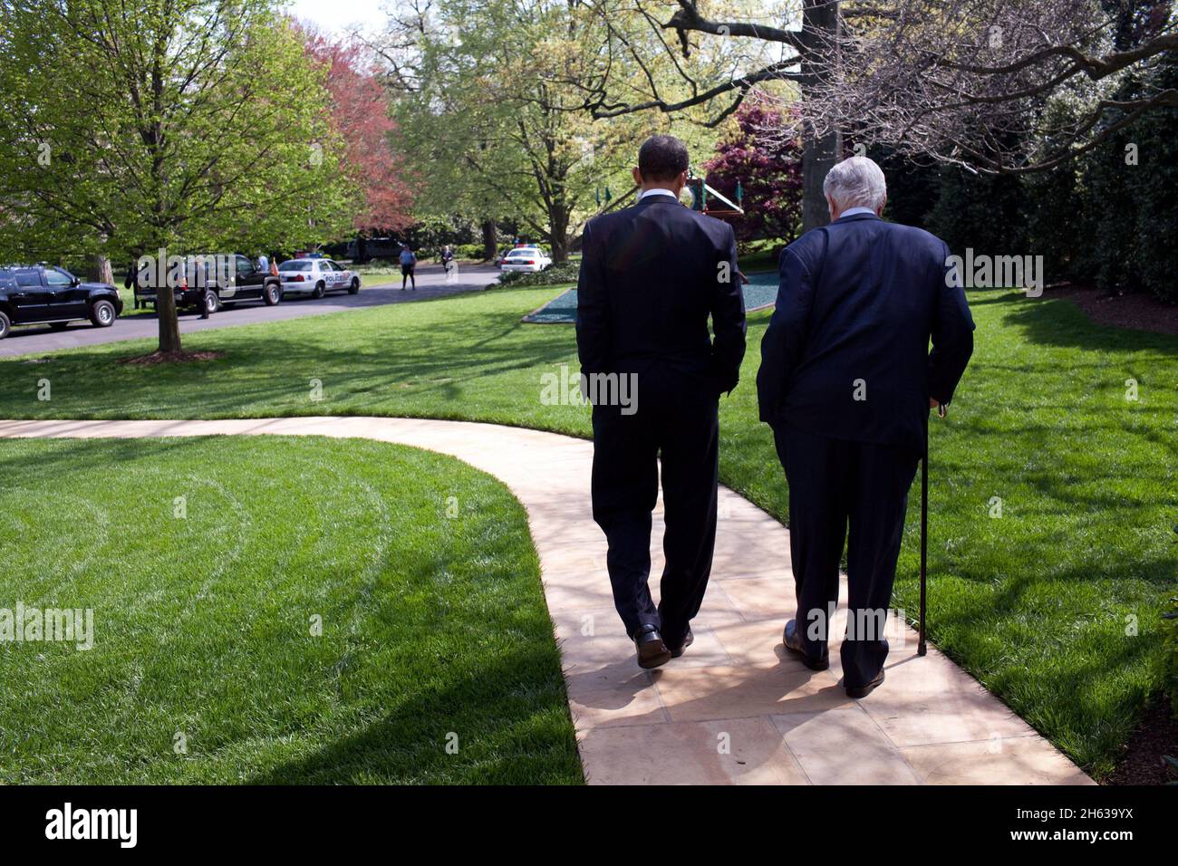 April 21, 2009 - President Obama escorts Sen. Edward Kennedy to the motorcade from the Oval Office en route to a national service event at the Seed School, where the President also signed the Kennedy Service Act. Stock Photo