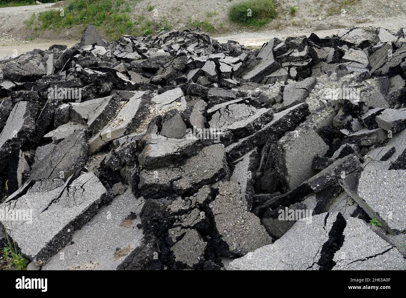 germany,bavaria,storage place,recycling,road construction,removed asphalt,pieces of tar,asphalt breakage Stock Photo
