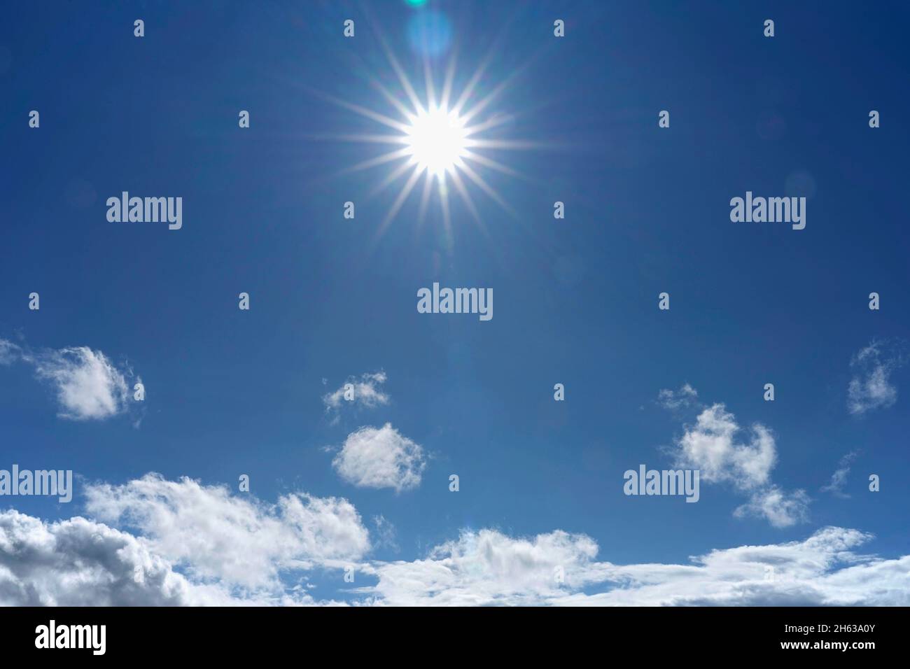 germany,bavaria,sun,sun star,blue sky with clouds Stock Photo