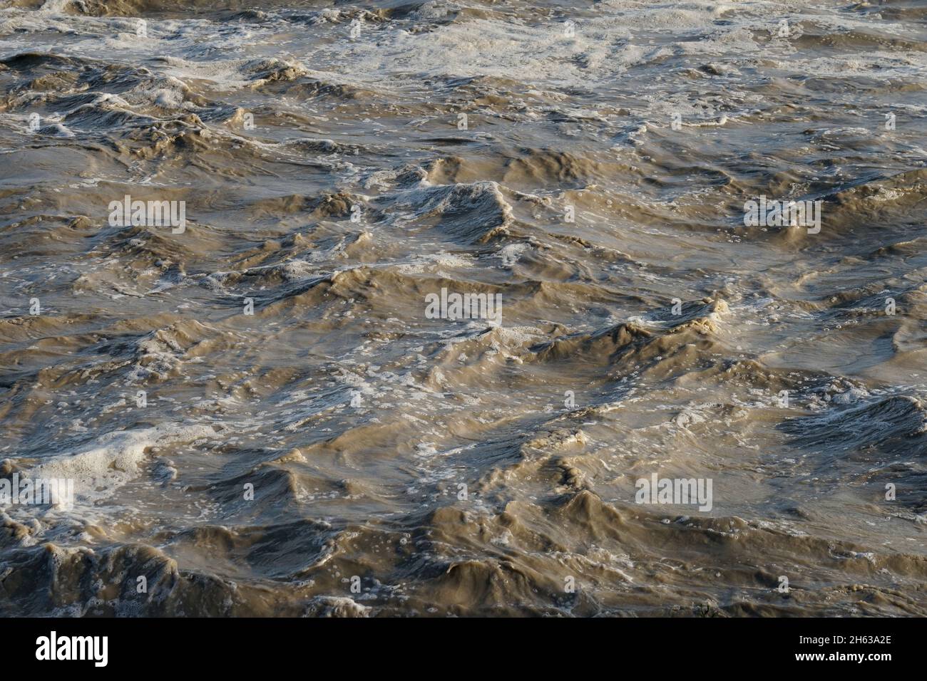 germany,bavaria,upper bavaria,neuötting,inn,dirty flood water,fast flowing,raging Stock Photo