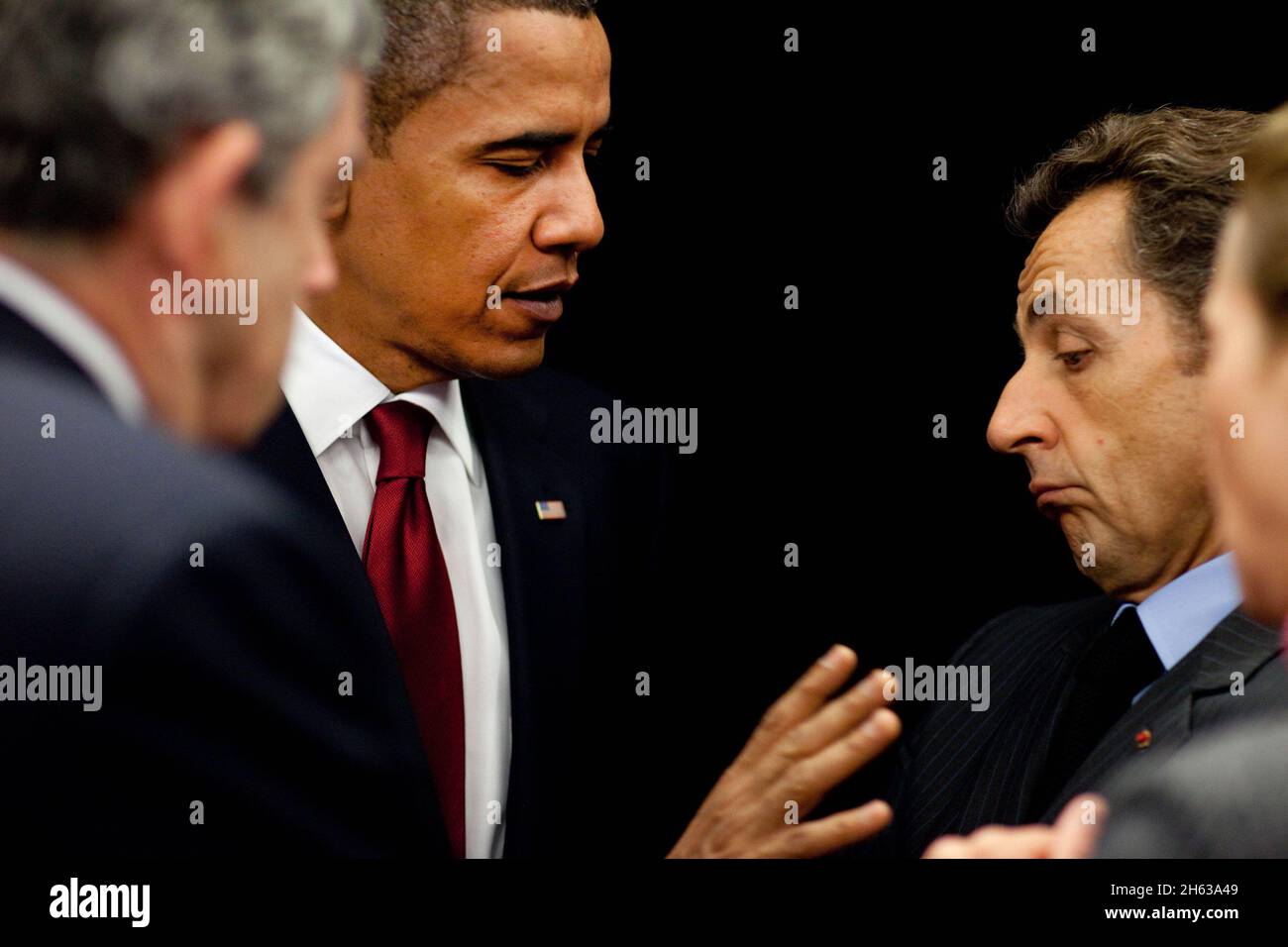 President Barack Obama talks with French President Nicolas Sarkozy and British Prime Minister Gordon Brown during the G-20 Summit in Pittsburgh, Pa., Sept. 25, 2009 Stock Photo