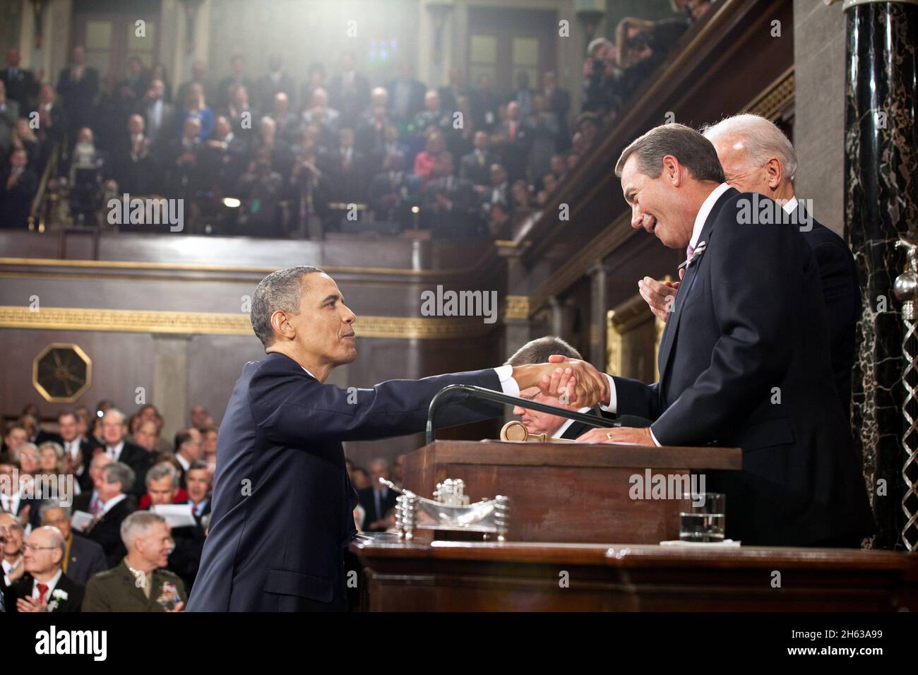 President Barack Obama shakes hands with Speaker of the House John Boehner before delivering the State of the Union address at the U.S. Capitol in Washington, D.C., Jan. 25, 2011. Stock Photo