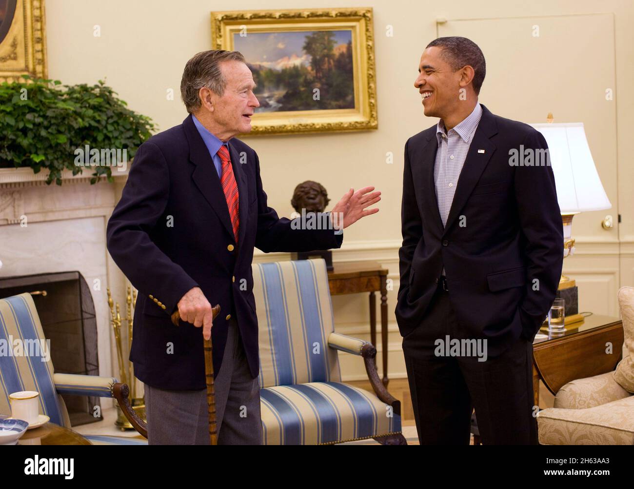 President Barack Obama meets with form President George H.W. Bush in the Oval Office Saturday, Jan. 30, 2010. Stock Photo