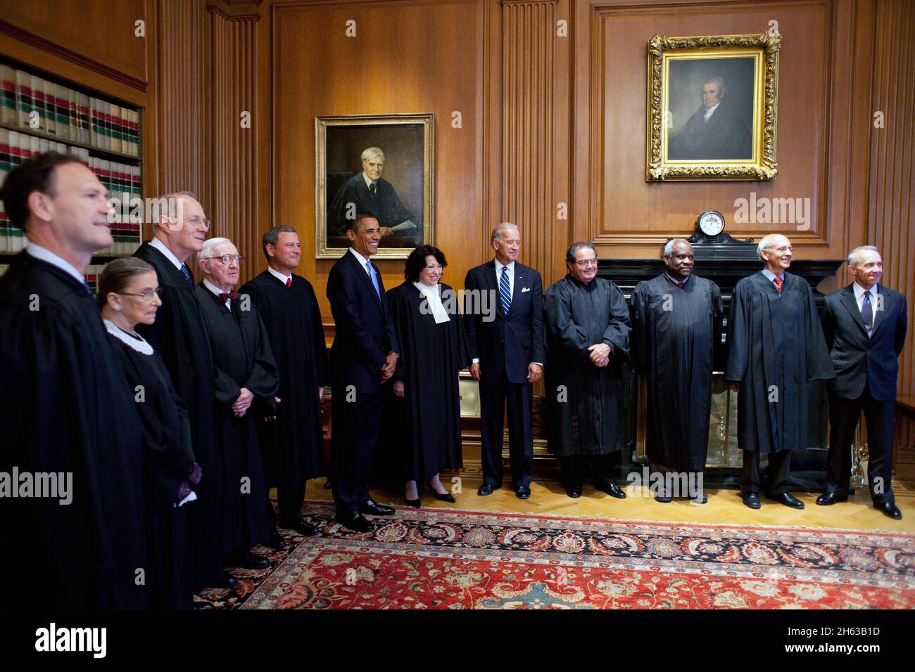 President Barack Obama and Vice President Joe Biden meet with Supreme Court Justices prior to the investiture ceremony for Justice Sonia Sotomayor, at the Supreme Court in Washington, DC, Sept. 8, 2009. From left: Associate Justices Samuel Alito, Ruth Bader Ginsburg, Anthony M. Kennedy, John Paul Stevens, Chief Justice John Roberts, President Barack Obama, Associate Justice Sonia Sotomayor, Vice President Joe Biden, Associate Justices Antonin Scalia, Clarence Thomas, Stephen Breyer, and retired Associate Justice David Souter. Stock Photo