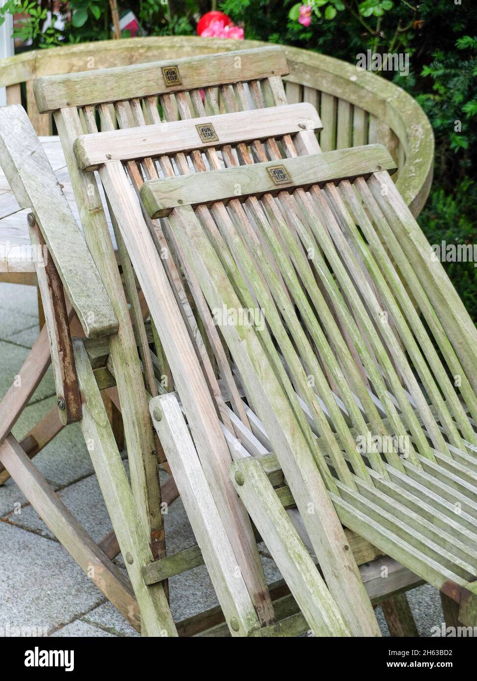 clean garden furniture after winter; teak wood Stock Photo