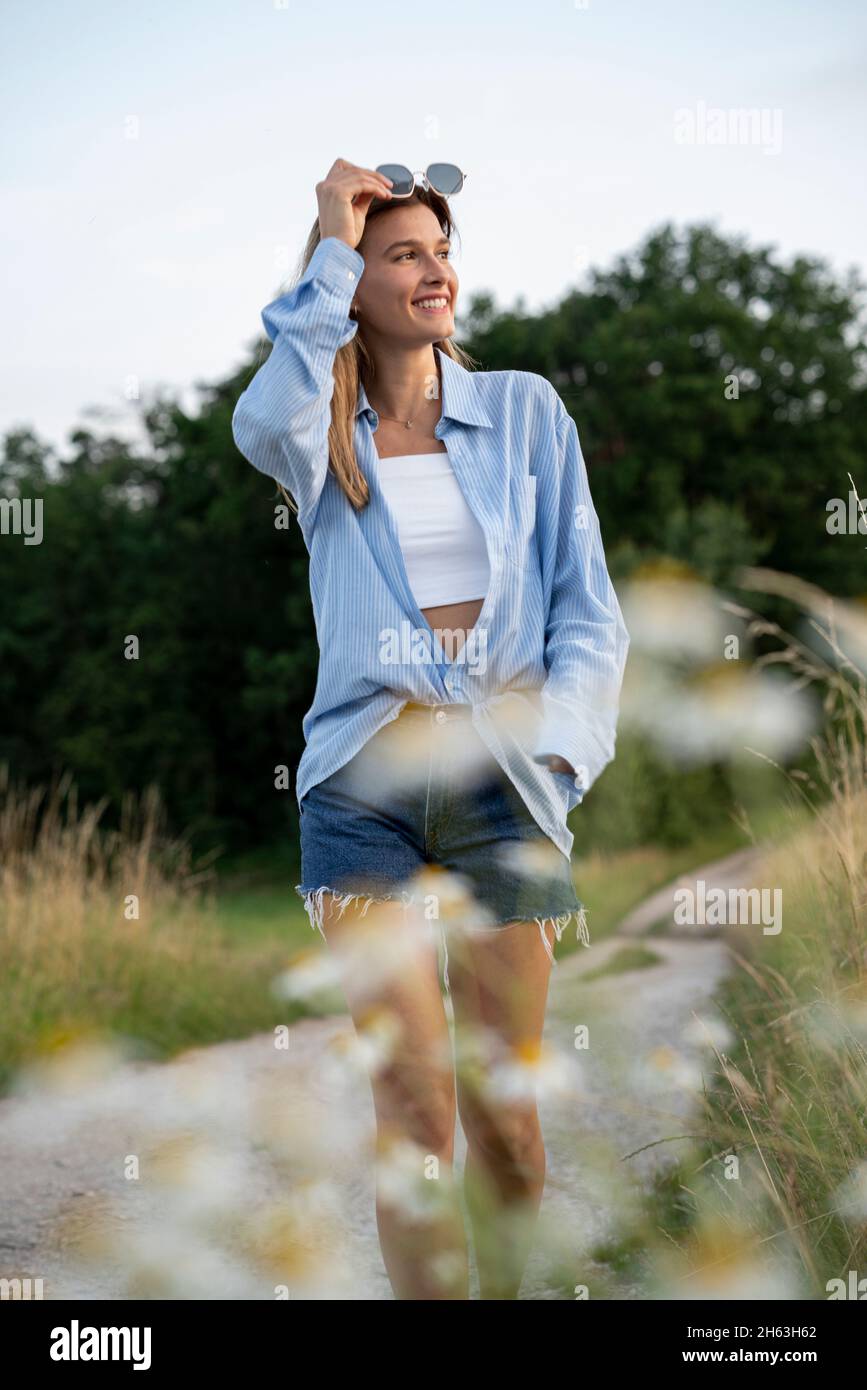 young woman enjoys the summer in the country,franconia,bavaria,germany Stock Photo