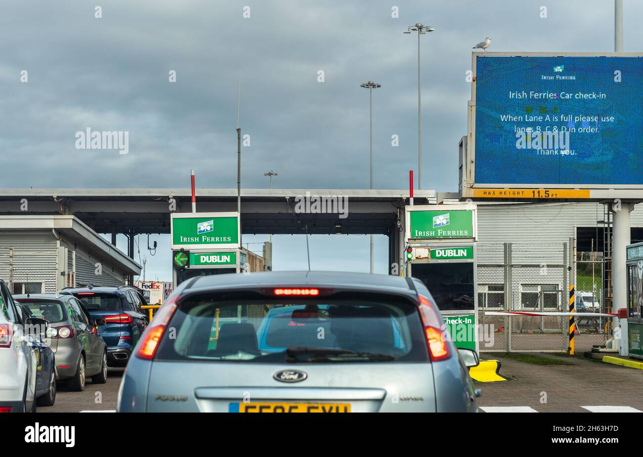 Cars waiting to board an Irish Ferries ship at Holyhead Port, North Wales, UK. Stock Photo