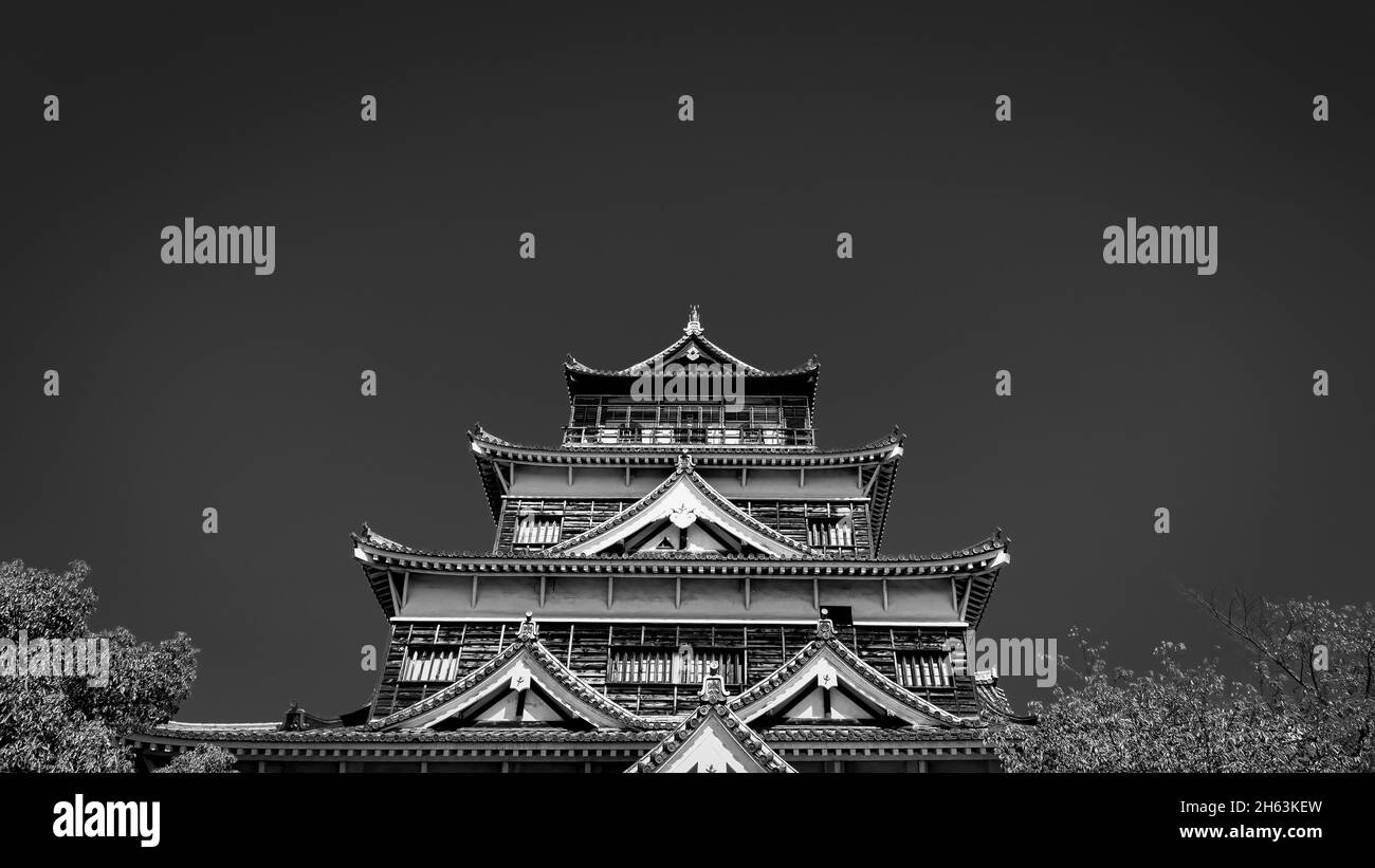 Looking up at the Hiroshima Castle, a reconstruciton of the original 16th century which was destroyed by the atomic bombing in 1945. Stock Photo