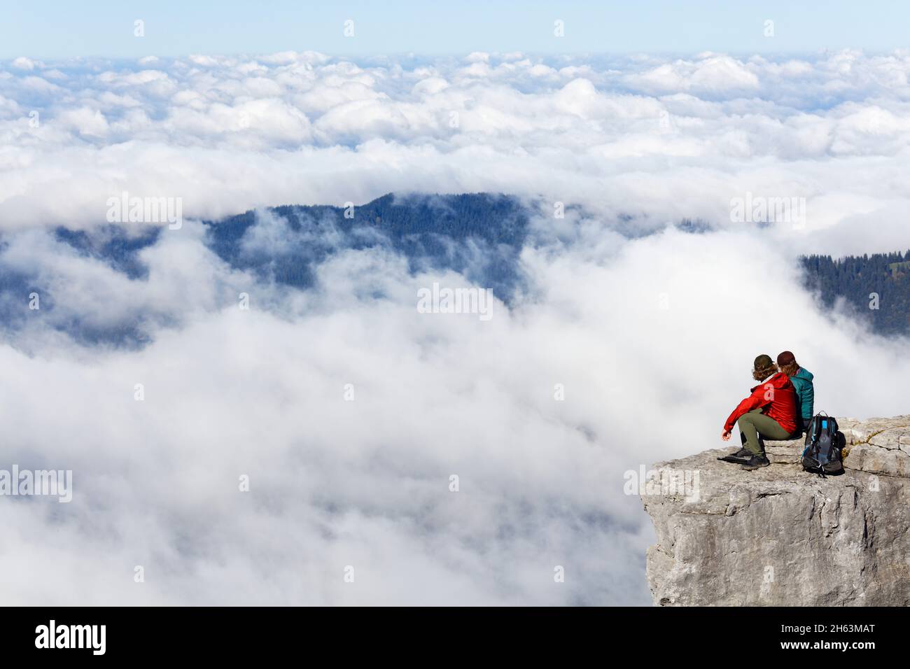 Couple on top cliff above hi-res stock photography and images - Alamy