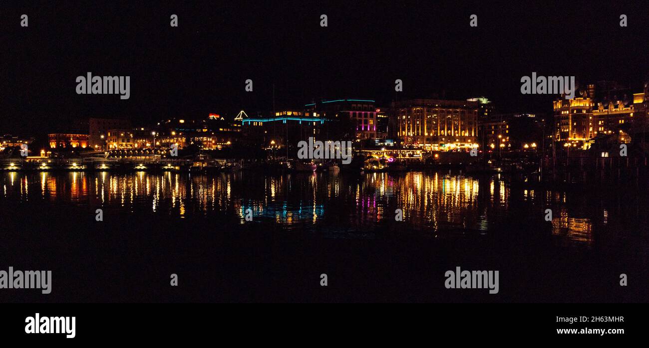 Night photography in Victoria, British Columbia, Canada.  Inner Harbour (Harbor) and downtown. Stock Photo
