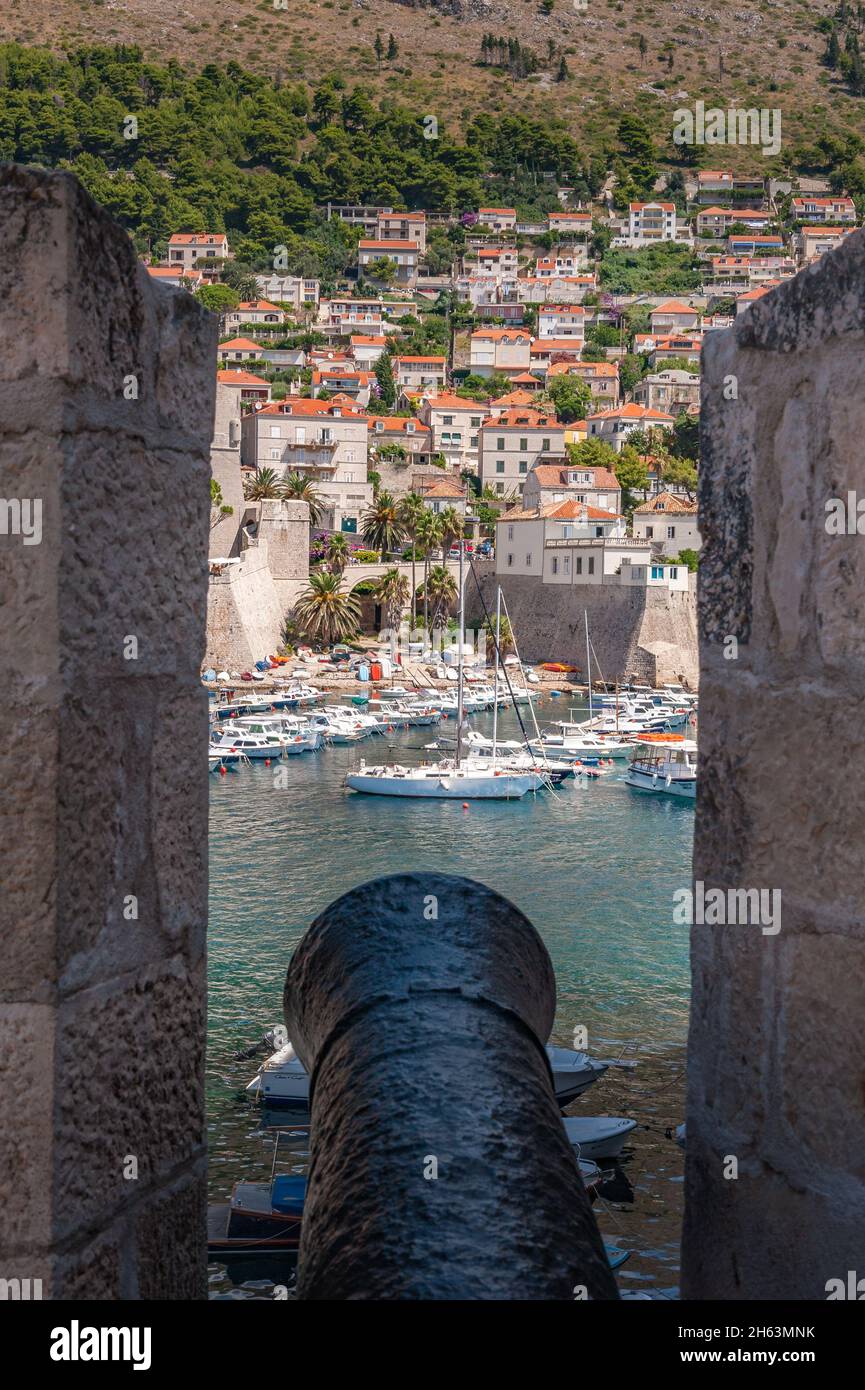 Old Dubrovnick viewed through cannon port in the city wall Stock Photo