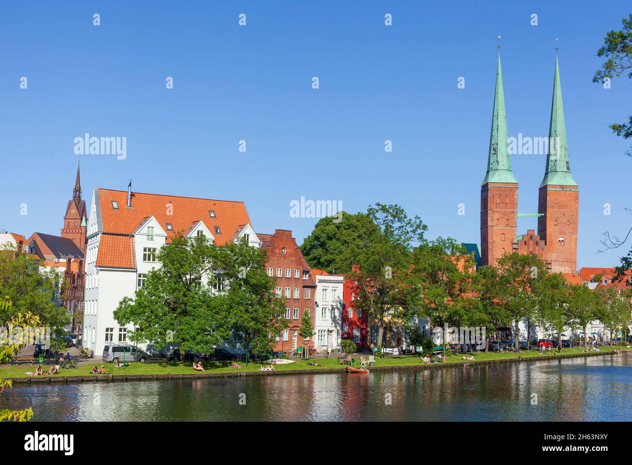 historic houses on the obertrave with luebeck cathedral,luebeck ...