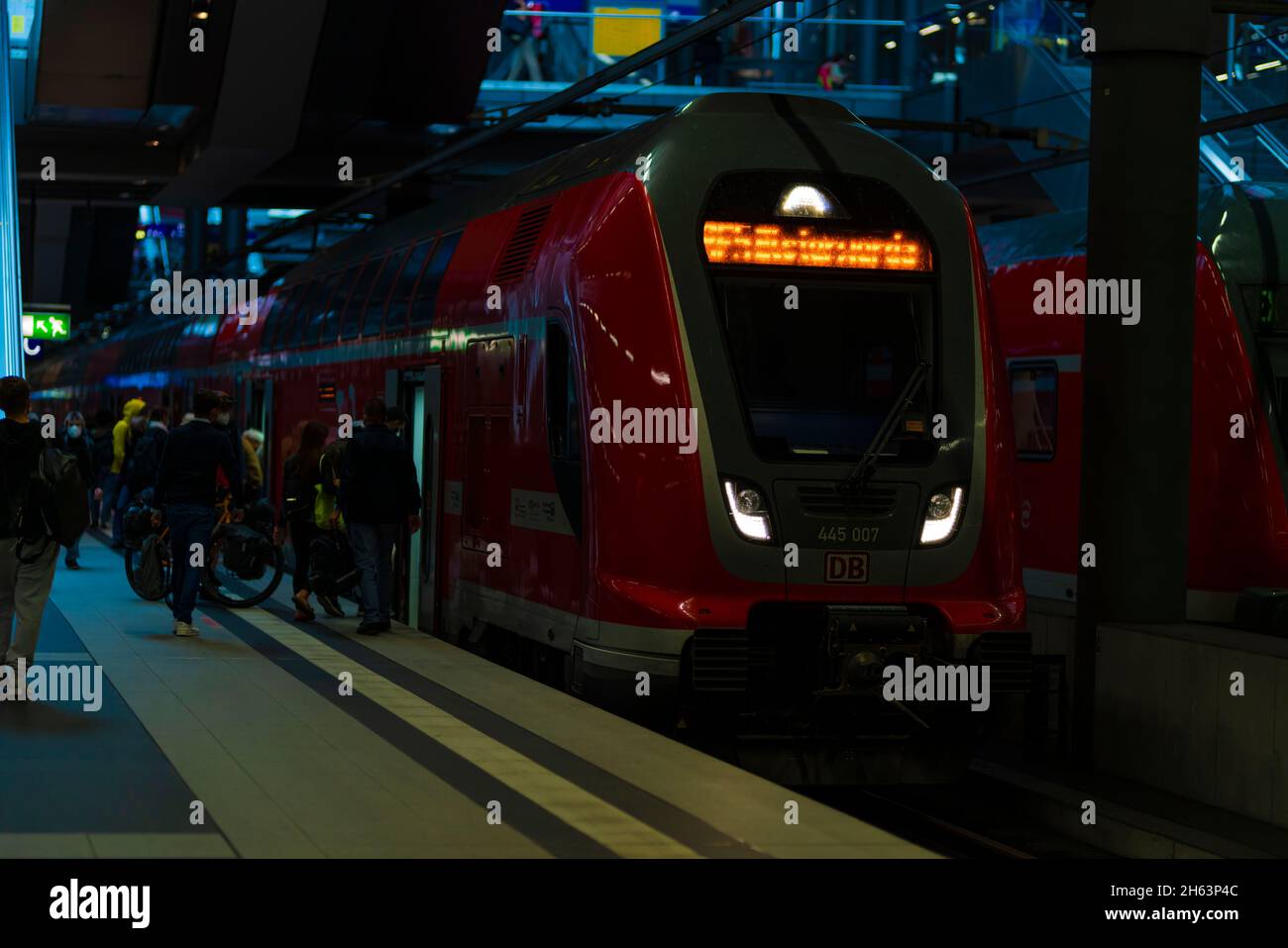 germany,berlin,passengers board a train at the main station Stock Photo
