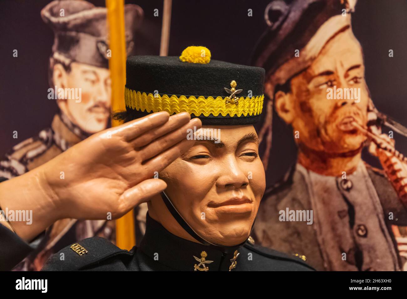 england,winchester,winchester's military quarter museums,the gurkha museum,statue of saluting gurkha soldier Stock Photo