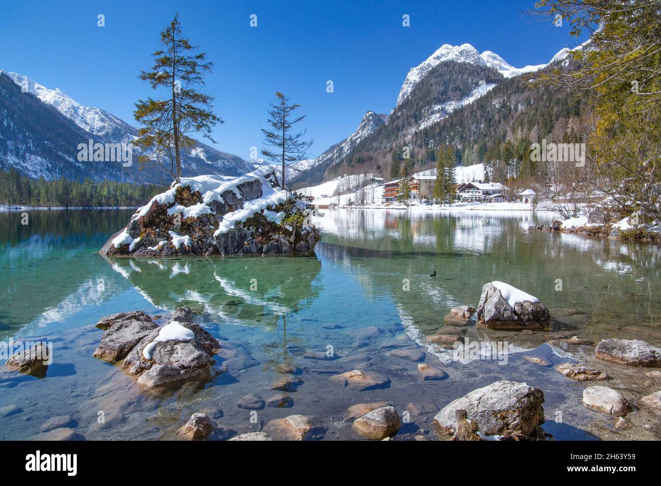 rocks in hintersee against reiteralpe,ramsau,berchtesgaden alps,berchtesgadener land,upper bavaria,bavaria,germany Stock Photo