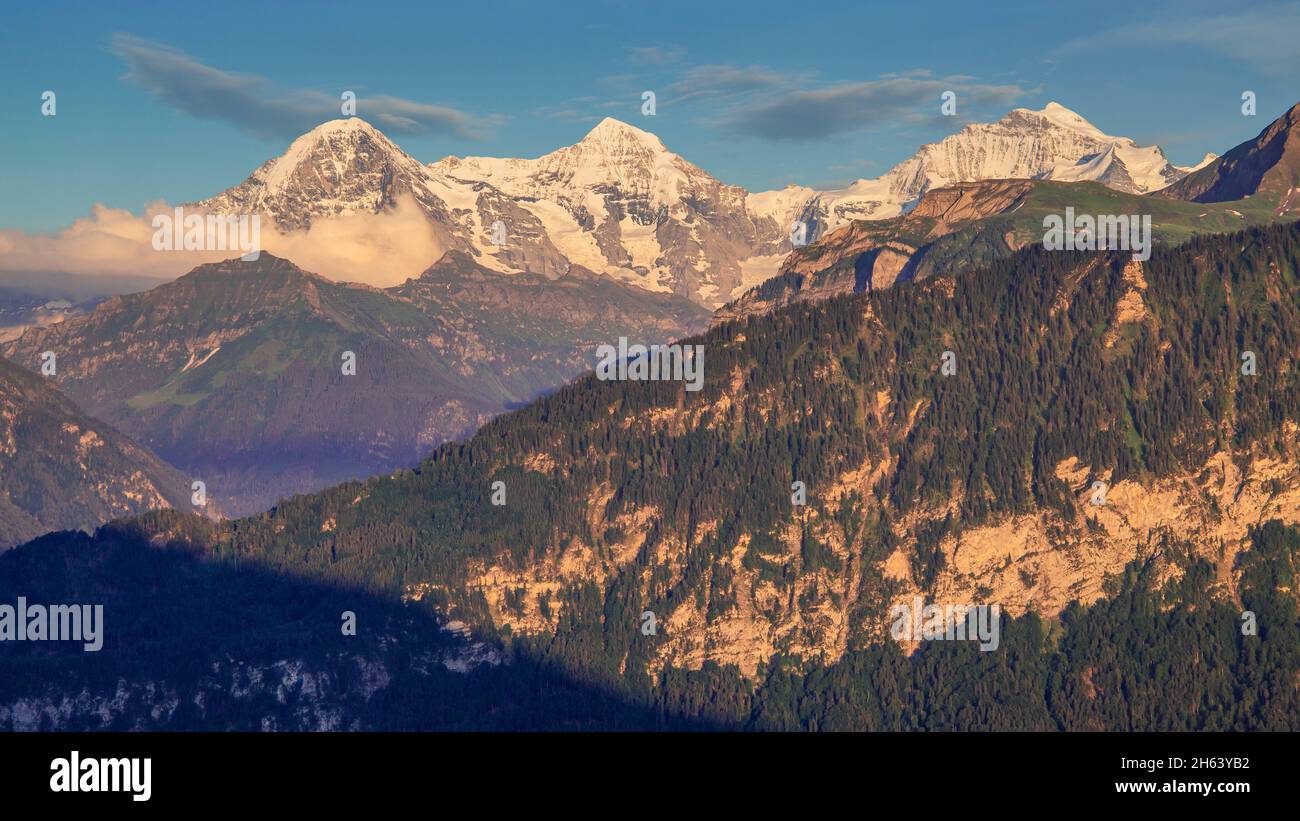 dreigestirn eiger 3967m,mönch 4107m and jungfrau 4158m in evening sun,beatenberg,bernese alps,bernese oberland,canton of bern,switzerland Stock Photo