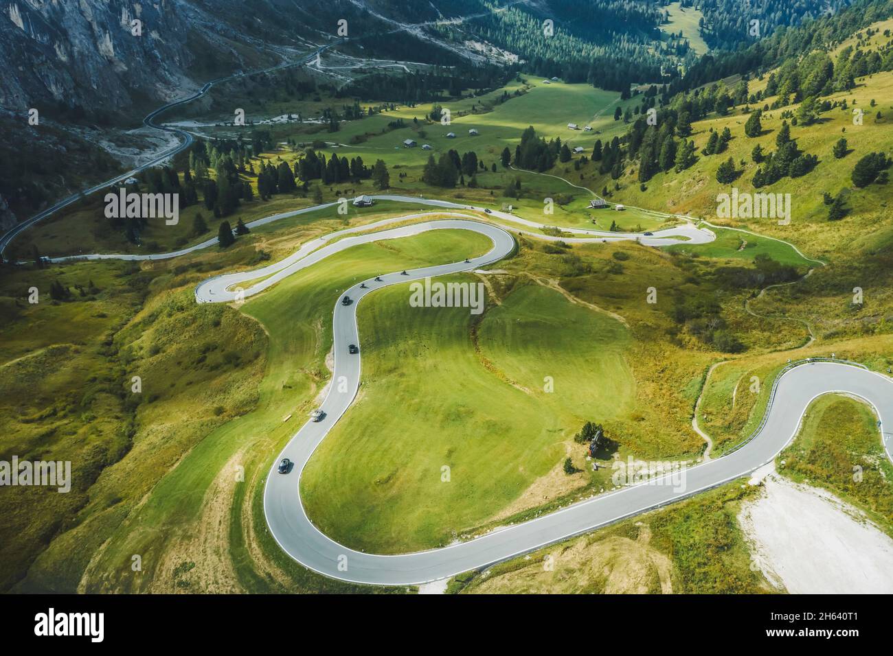 aerial view of serpentine roud of passo gardena and sella group mountains in dolomites,south tyrol,italy,europe. Stock Photo