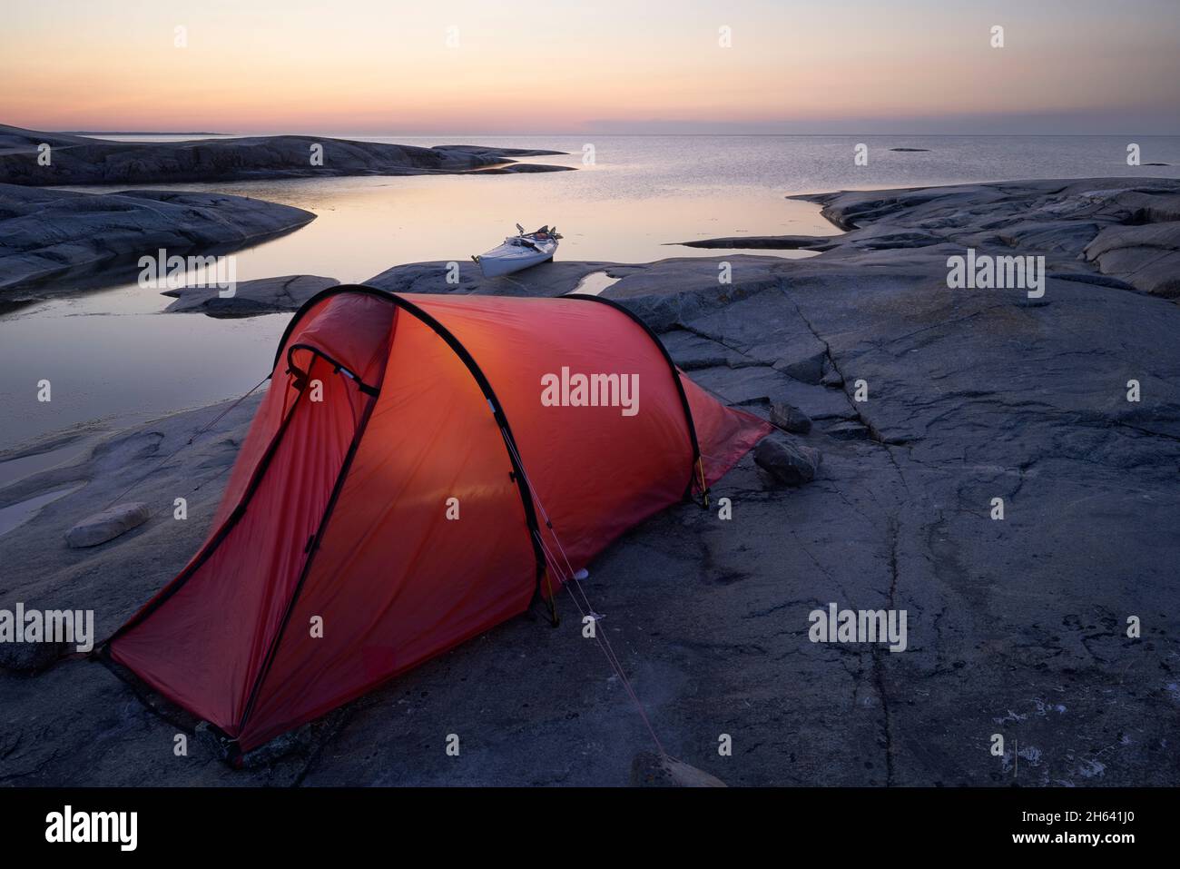 sweden,uppland,håkanskär island,stockholm archipelago,kayak and tent,summer night Stock Photo