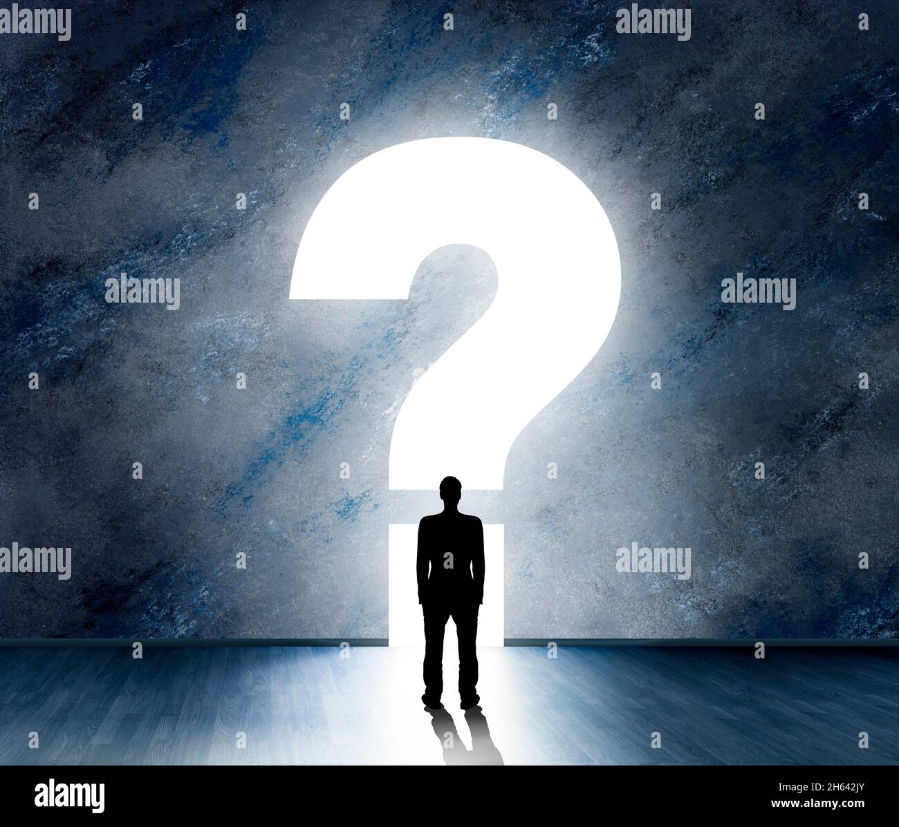 silhouette of a male person in front of a question mark Stock Photo
