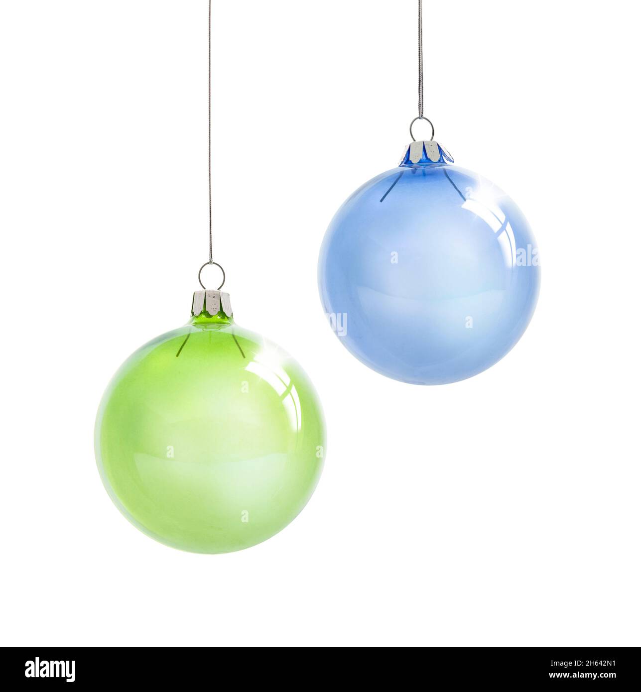 two beautiful christmas balls made of glass against a white background Stock Photo