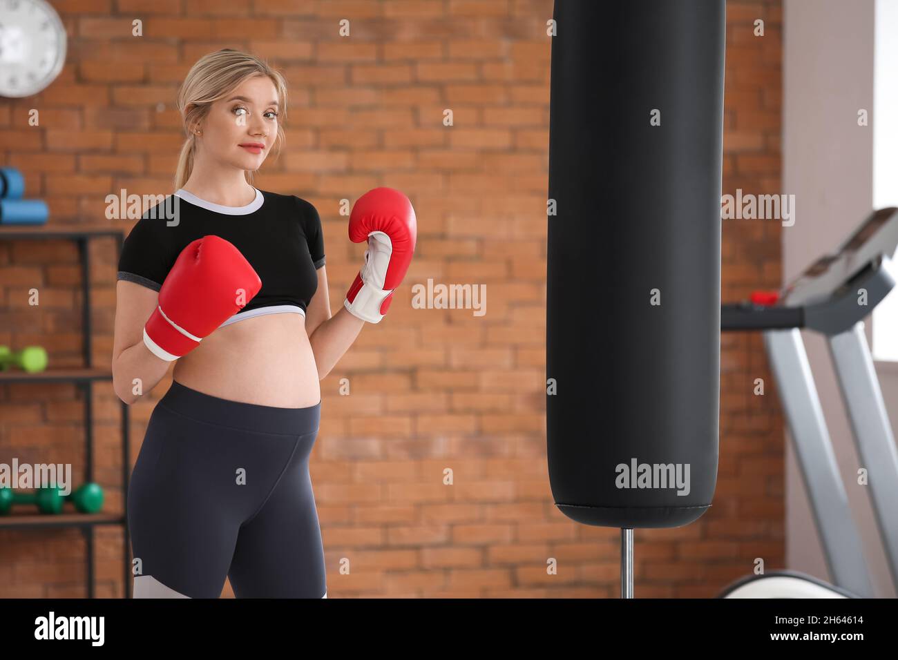 Young pregnant woman in boxing gloves at gym Stock Photo Alamy