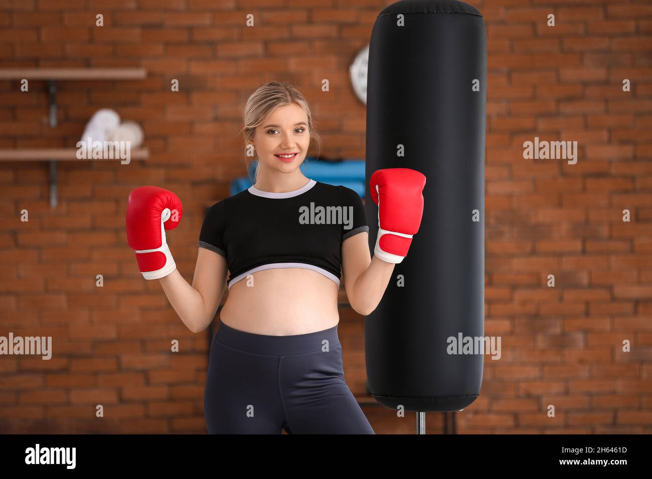 Young pregnant woman in boxing gloves at gym Stock Photo Alamy