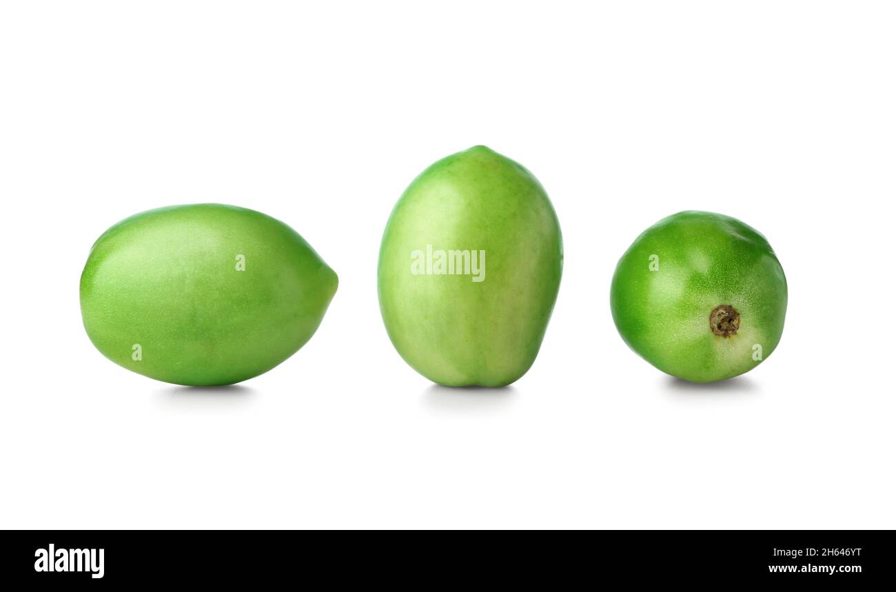 Fresh green tomatoes on white background Stock Photo - Alamy