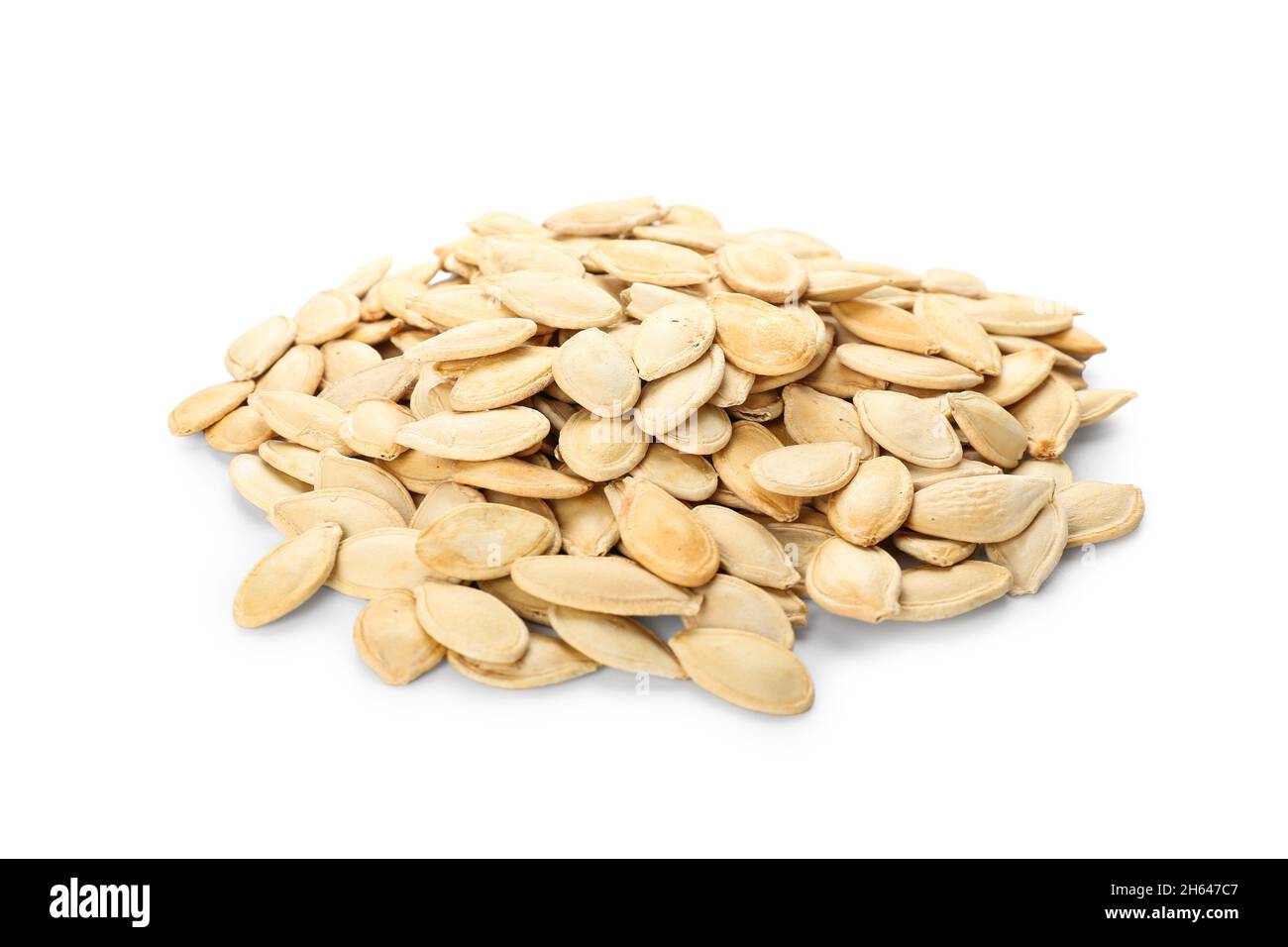 Heap of pumpkin seeds on white background Stock Photo