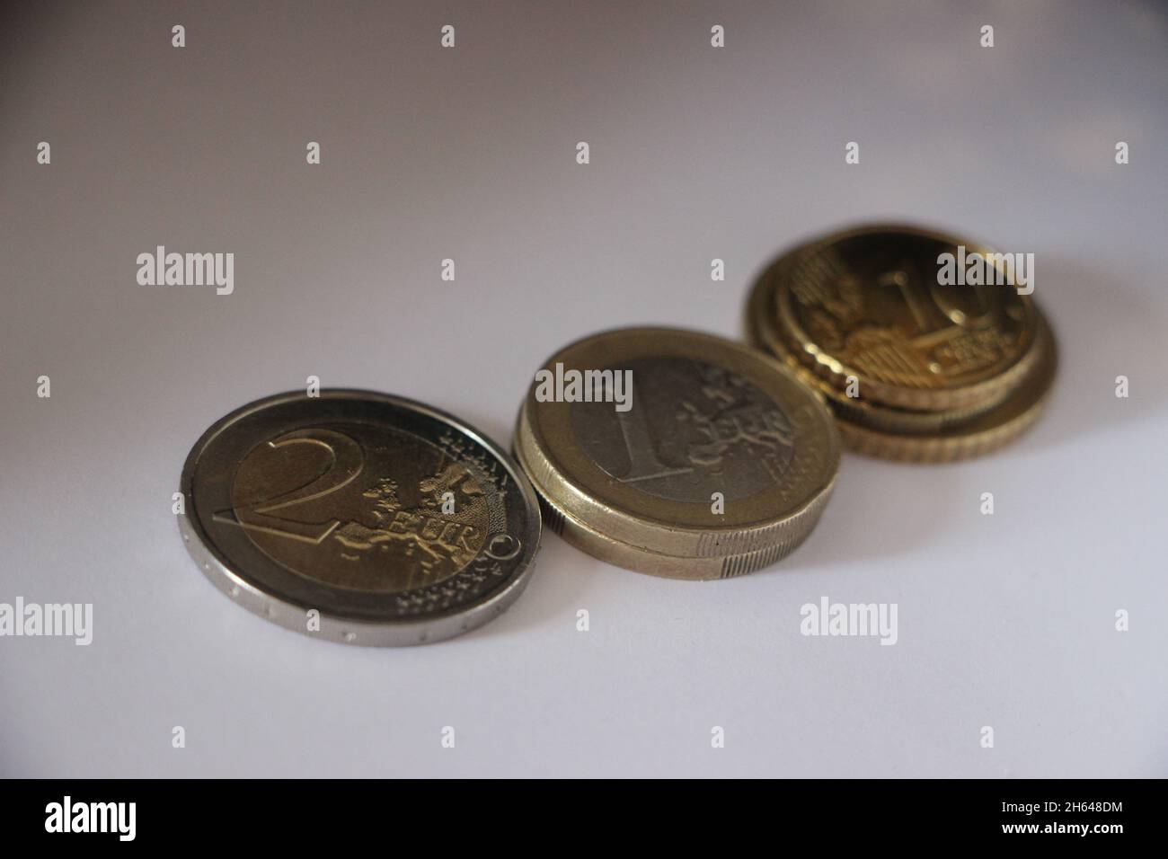 Euro coins on the table. Money and finance concept. Stock Photo